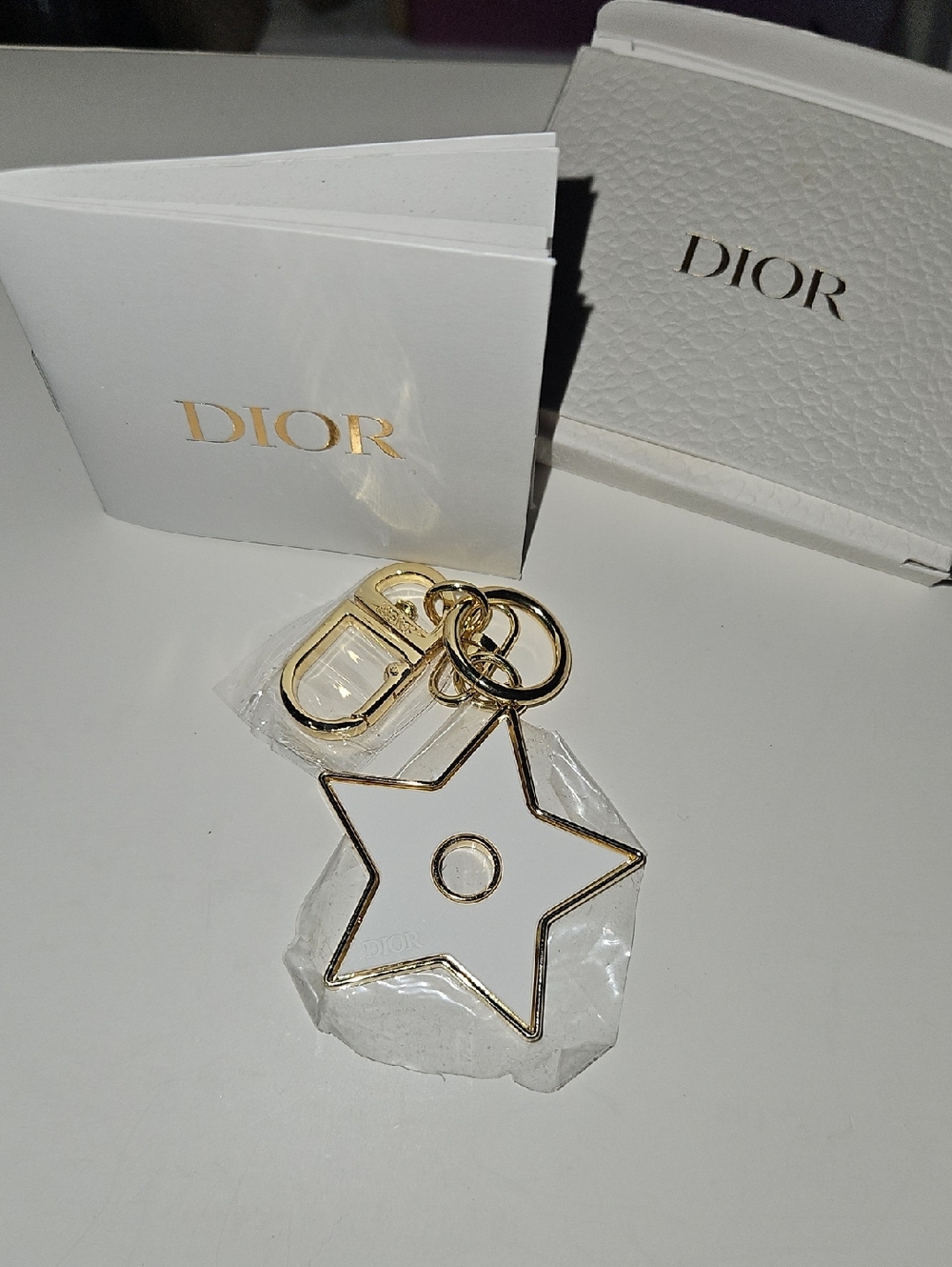 Dior Gold Star Keyring with Clear Acrylic Star